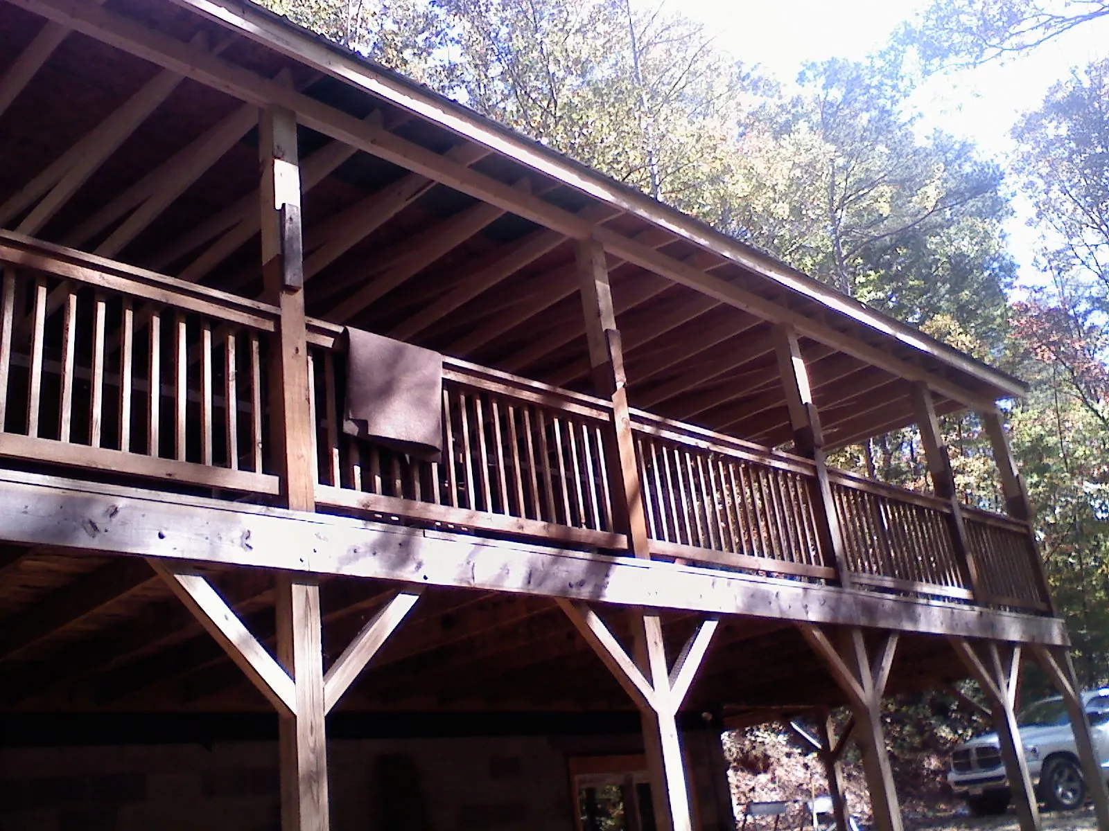 Timber framing under a new elevated porch and deck — Roof Leak Repair in Willow City by Roofing Brothers
